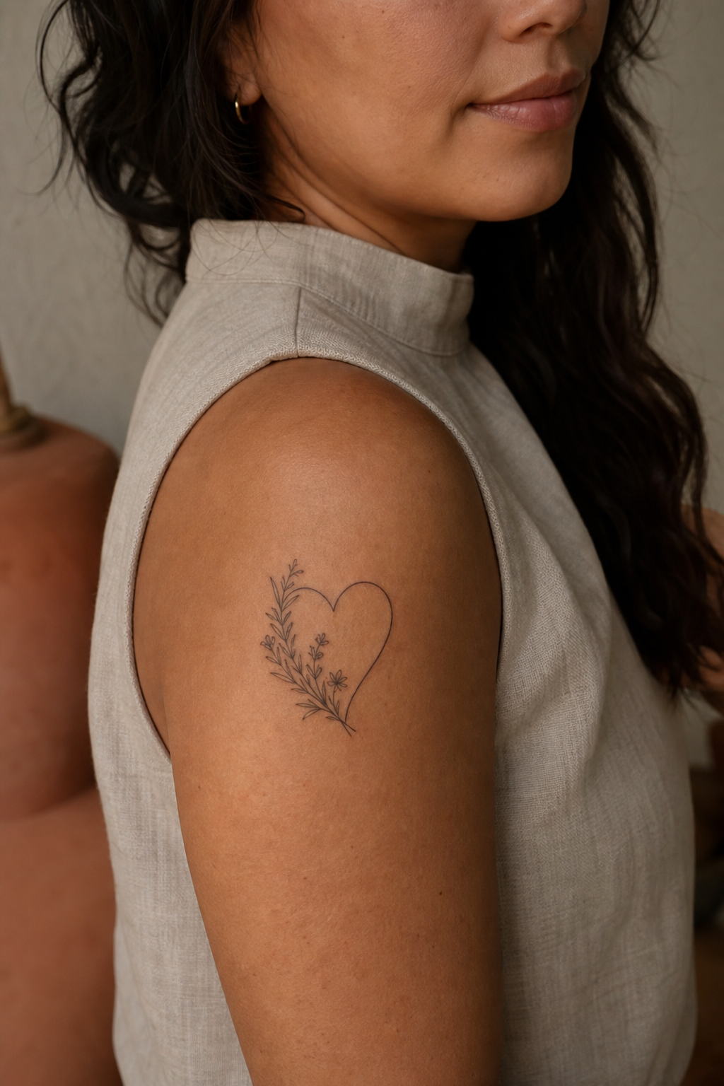 Botanical heart and wildflower shoulder tattoo