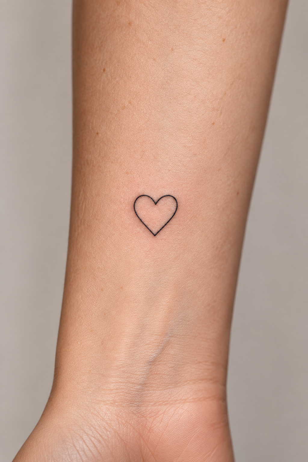 The Classic Outline Heart small heart tattoos idea