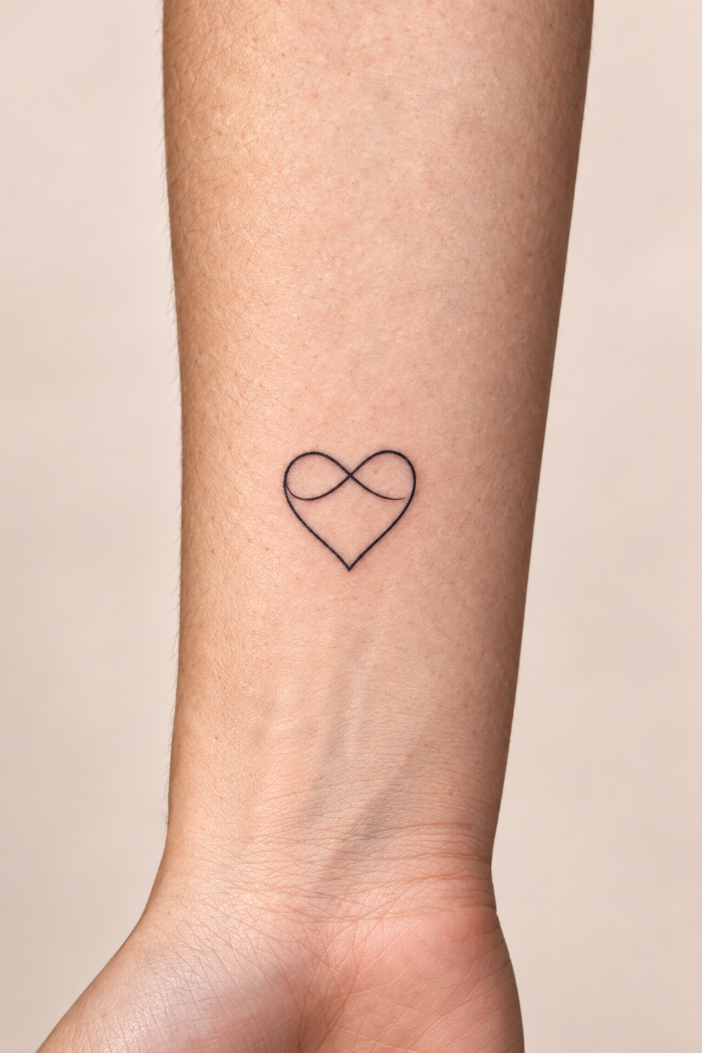 Heart and Infinity Symbol small heart tattoo idea