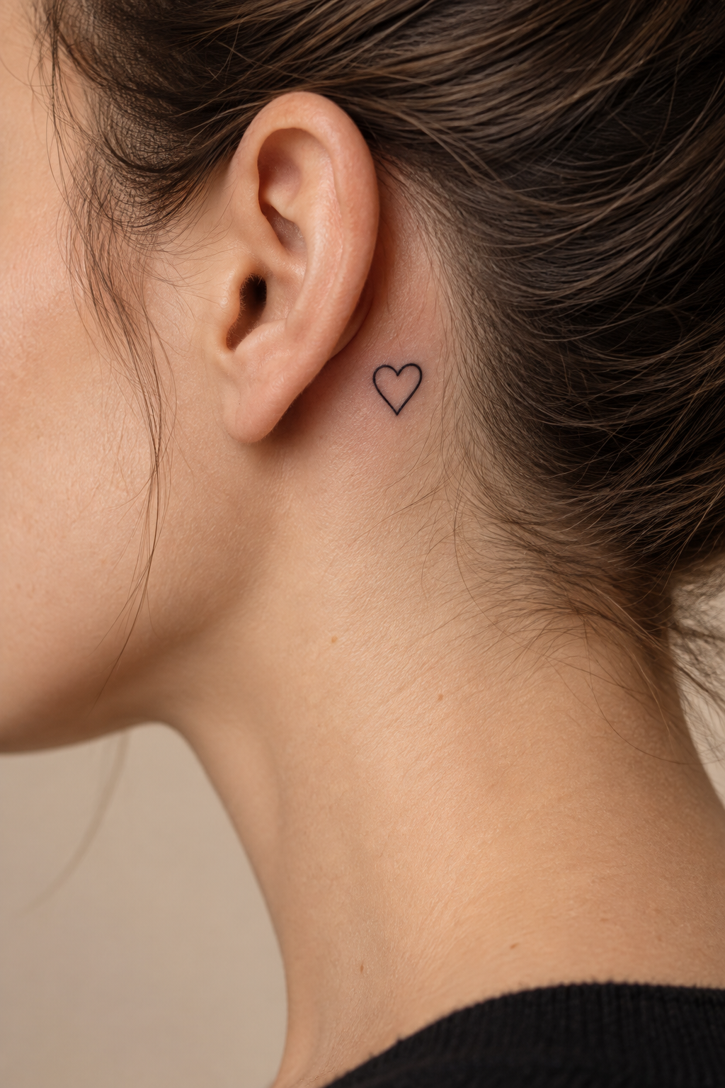 Simple Heart Outline Behind the Ear small heart tattoo idea