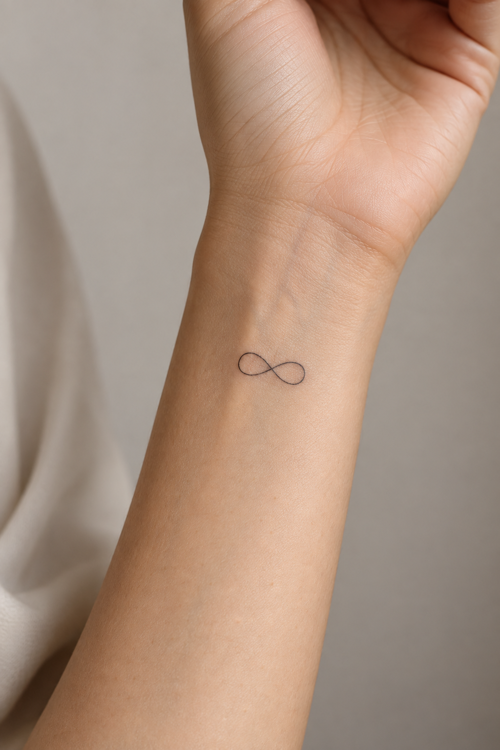 Tiny Infinity Symbols small friendship tattoo idea