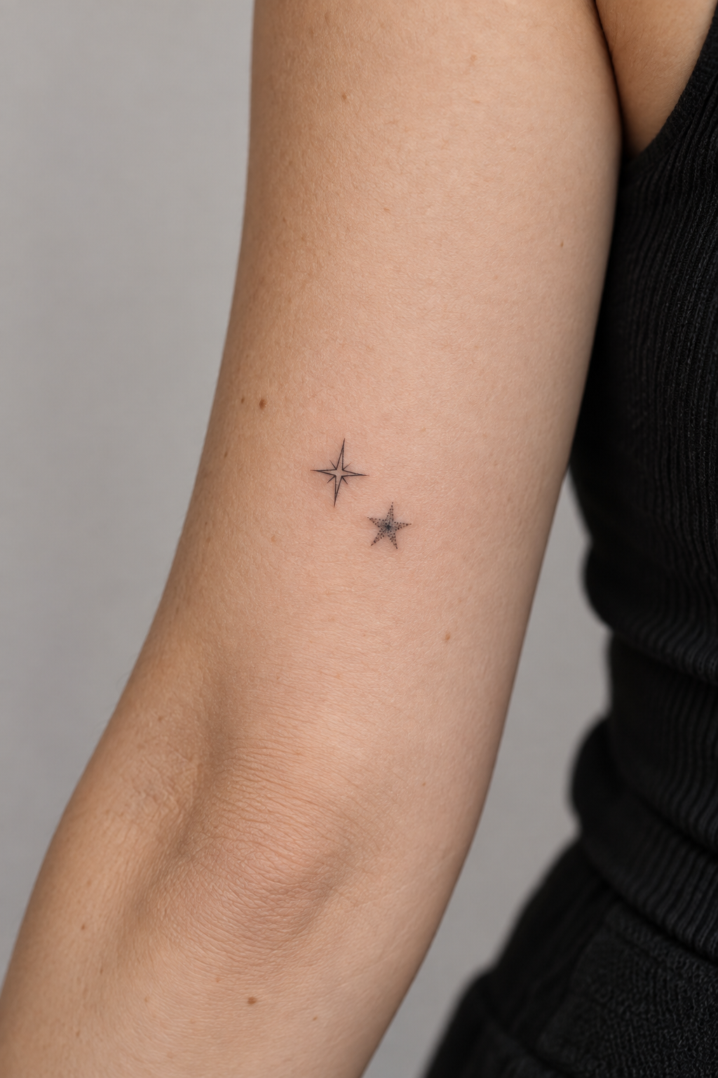 Minimalist Stars small friendship tattoo idea