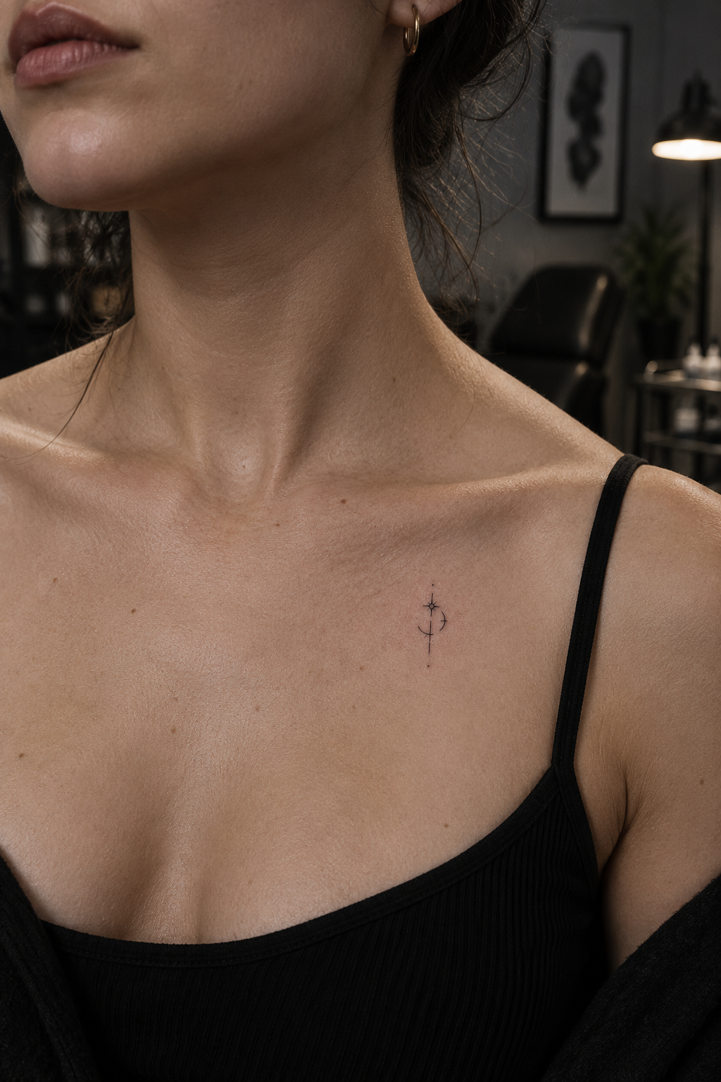 Simple compass mark small chest tattoo idea
