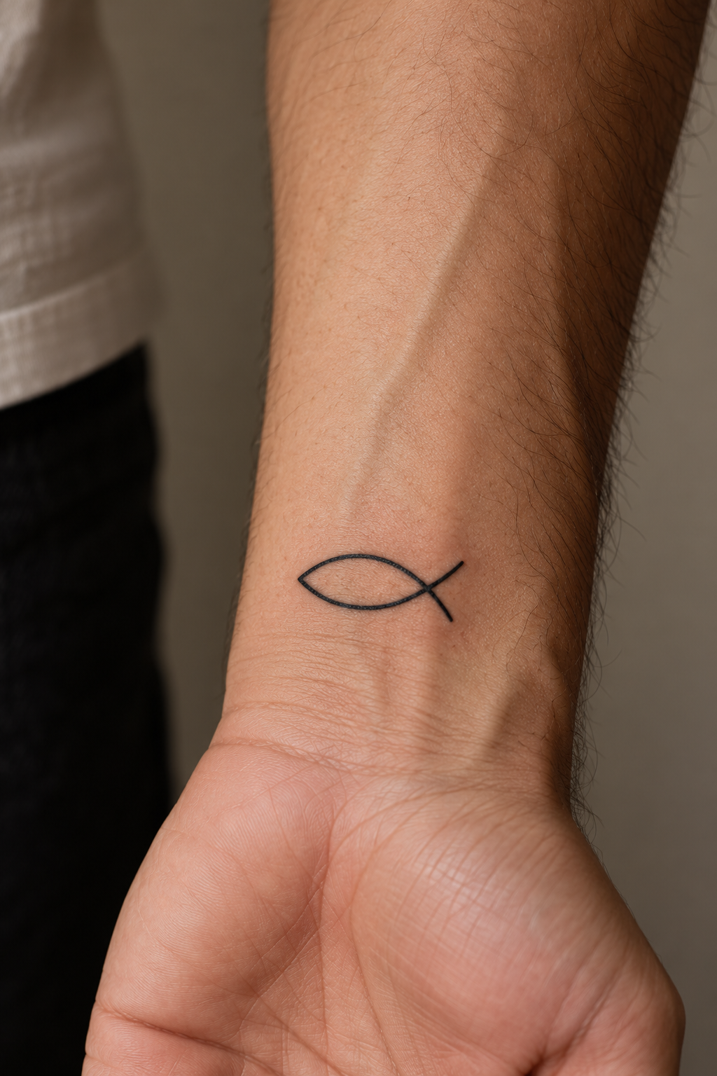 Christian Fish Symbol Tattoo Ideas featuring greek text and fish symbol on the upper chest