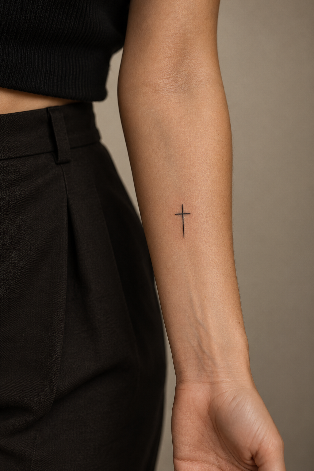 Small cross on the forearm Christian tattoo idea
