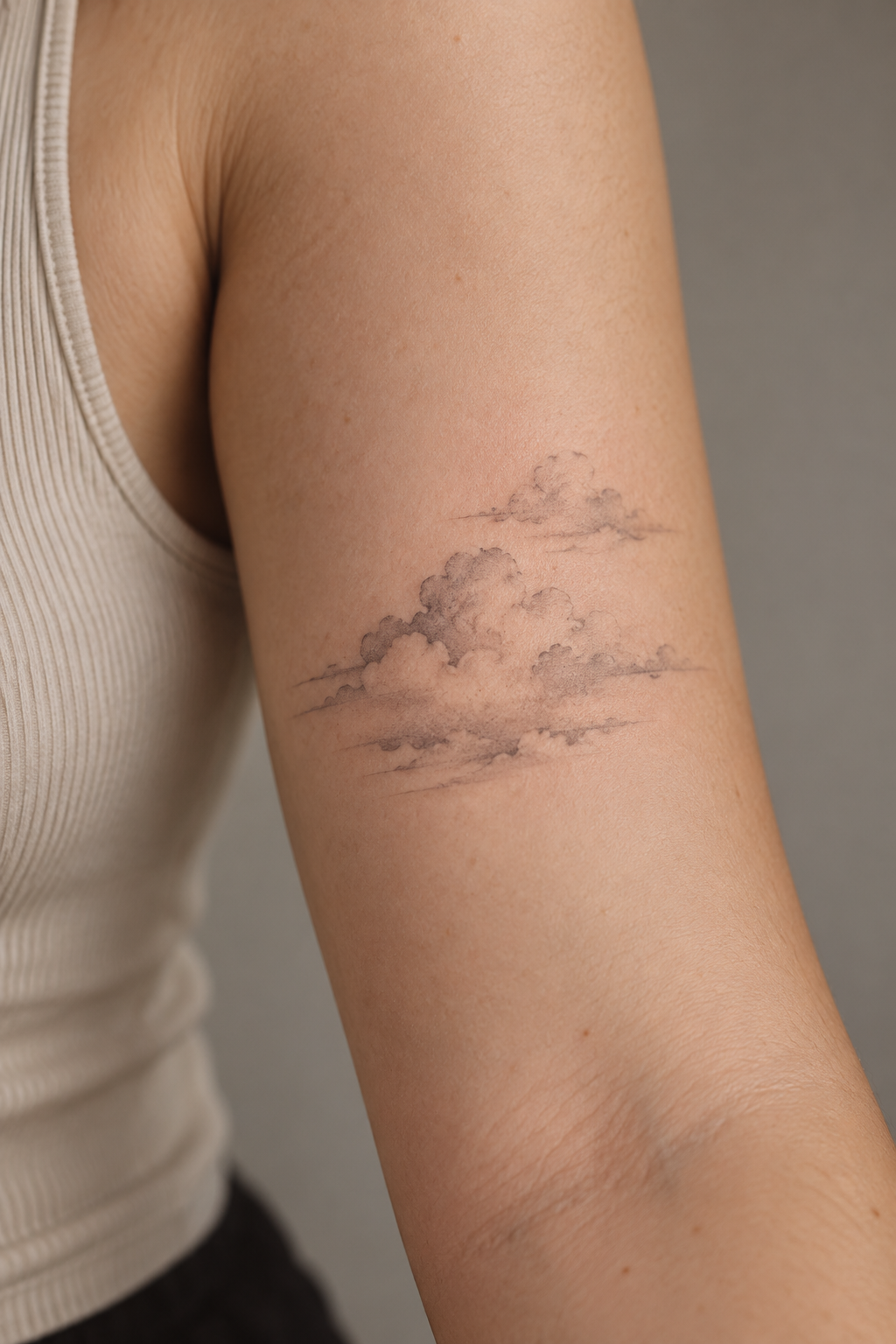 Minimalist Clouds small memorial tattoo idea