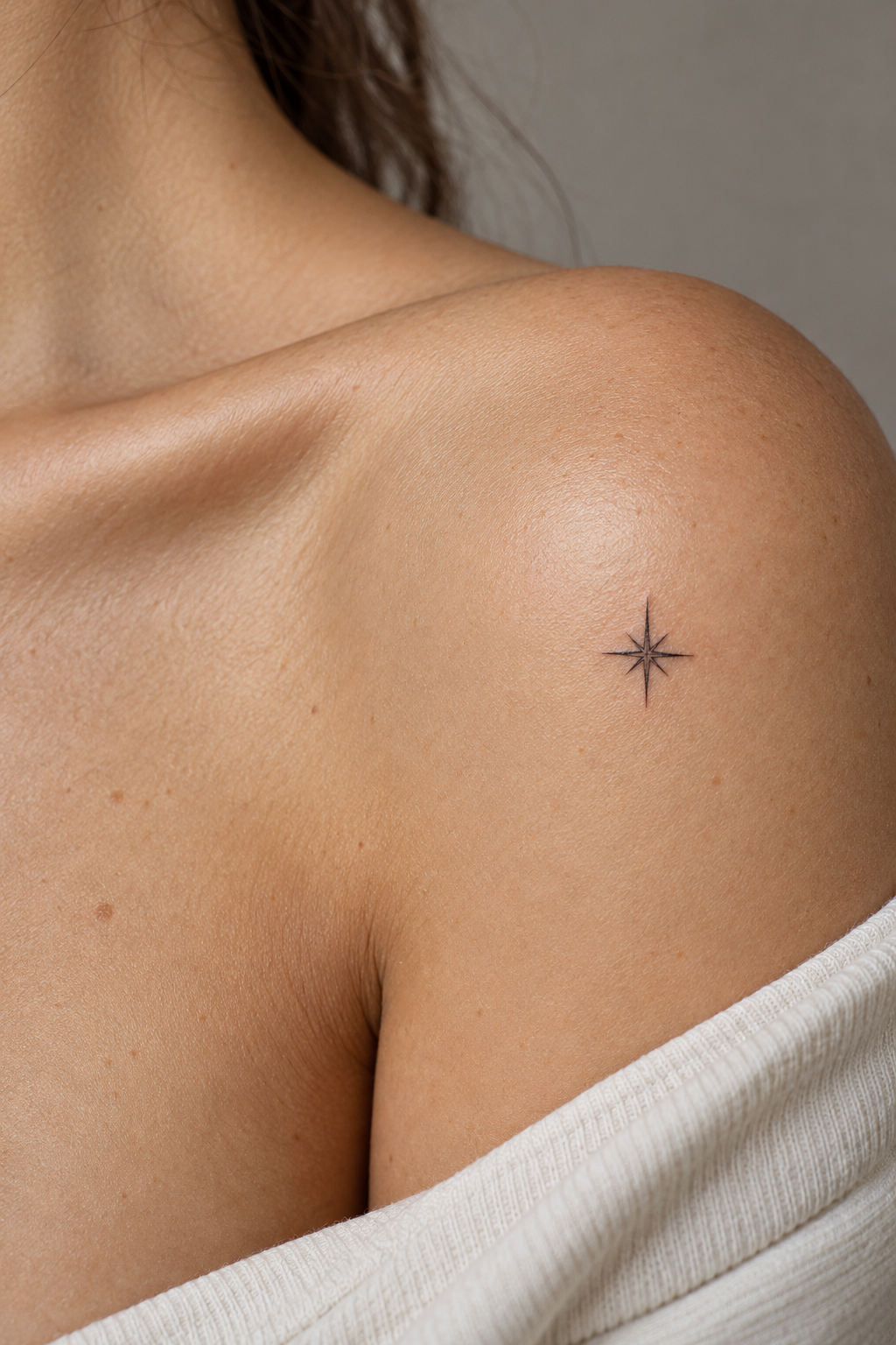 Tiny Meaningful Tattoo Ideas For Women featuring a tiny star symbol
