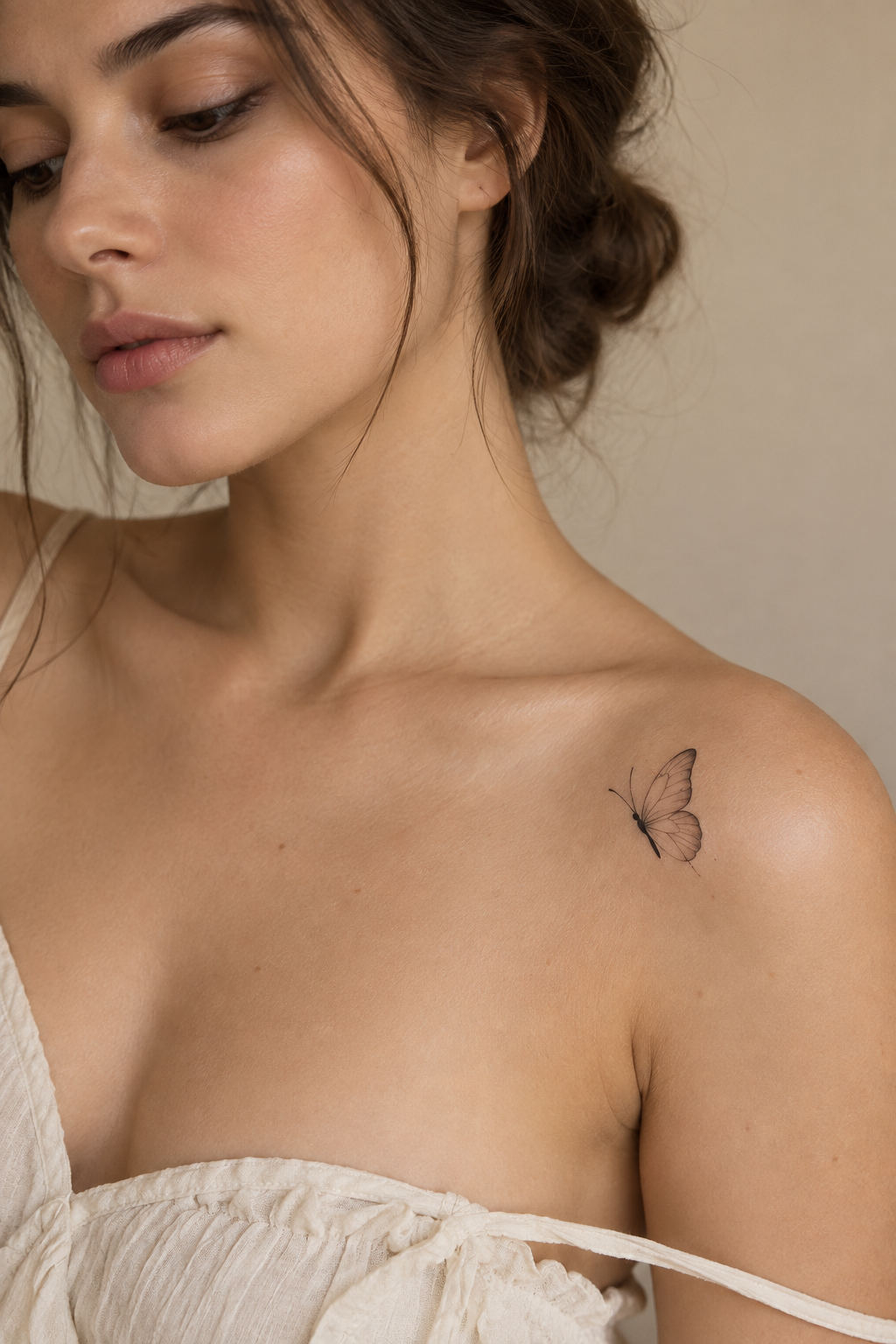 small girly tattoo ideas: minimalist butterfly