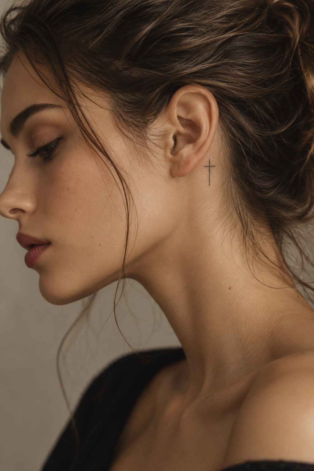 small cross placed behind the ear small biblical tattoos cross idea
