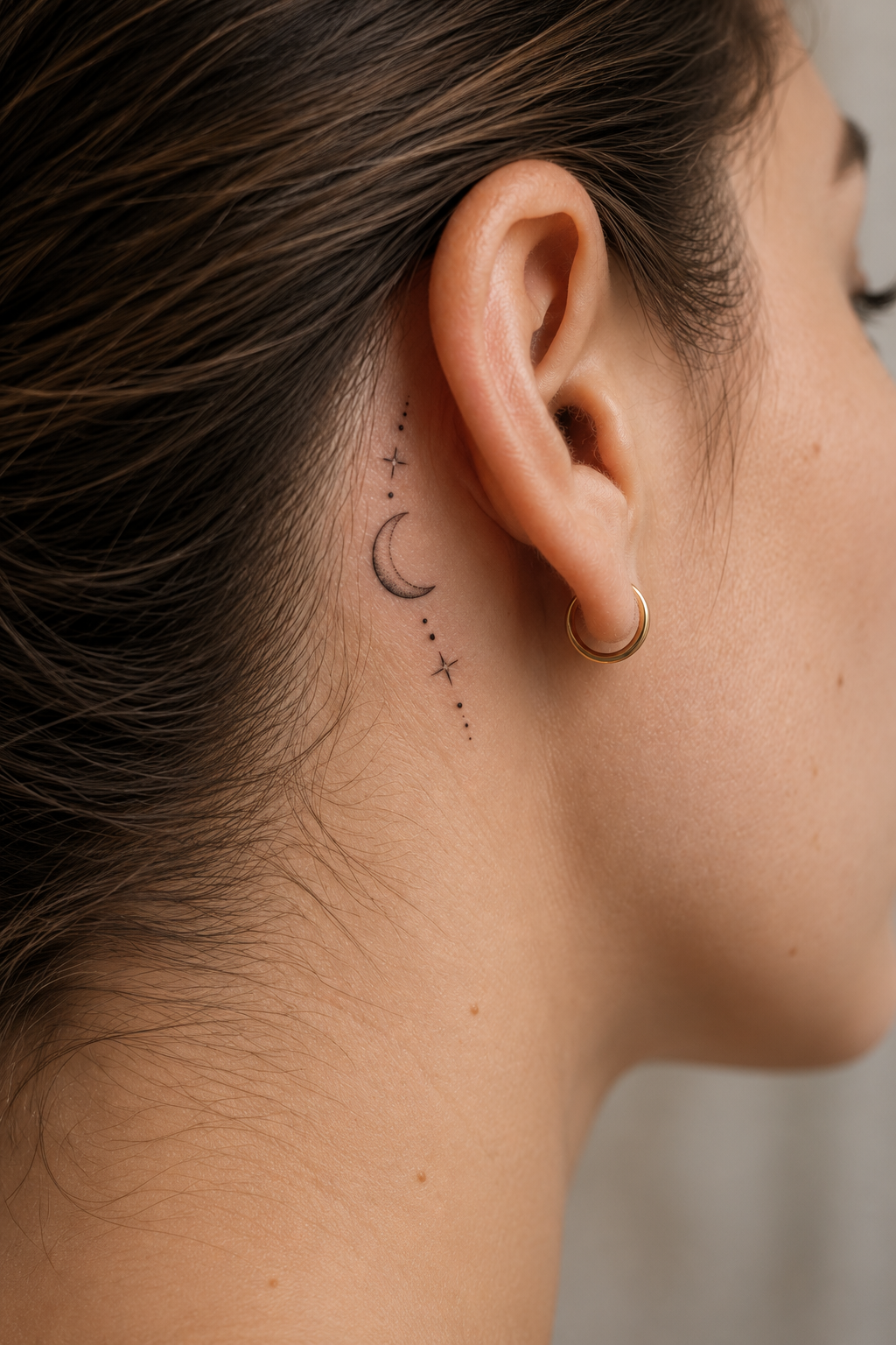 behind the ear tattoo ideas for women: a compact geometric mark