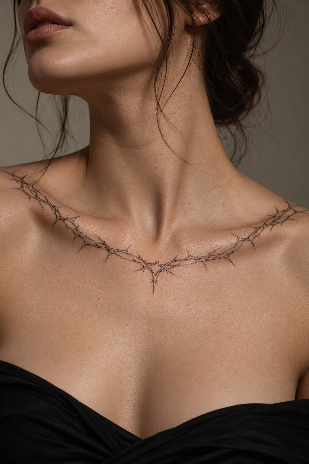 crown of thorns at the collarbone feminine biblical tattoo